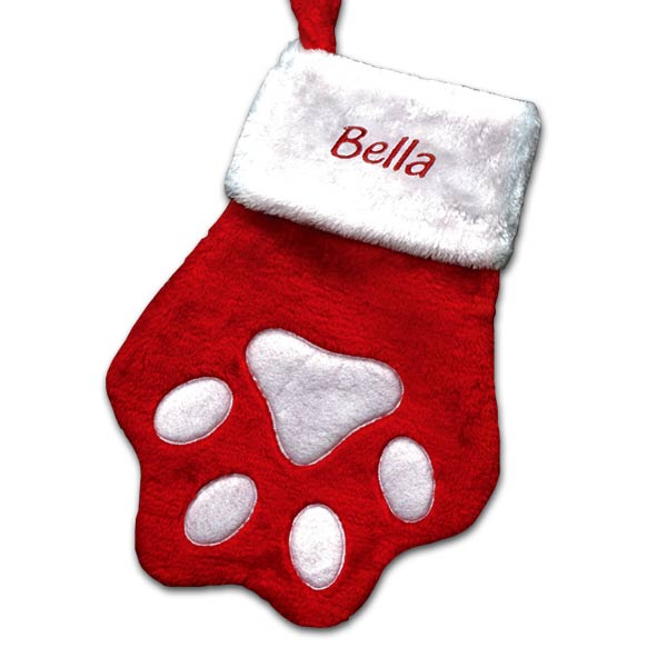 Personalized pet stocking in the shape of a paw with your pets name embroidered on it