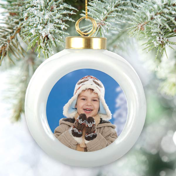 Porcelain ball ornament with your own photo makes a great gift each year