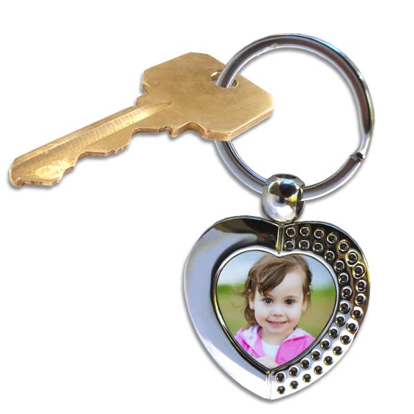 Choose from our many key chains and add a photo to this designer heart key ring