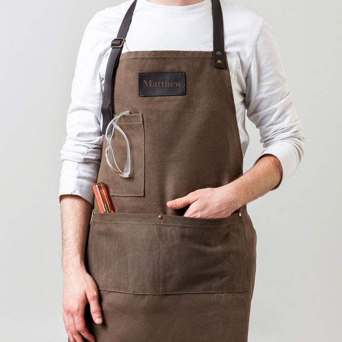 Create a beautiful canvas apron with leather accents and your name engraved on it